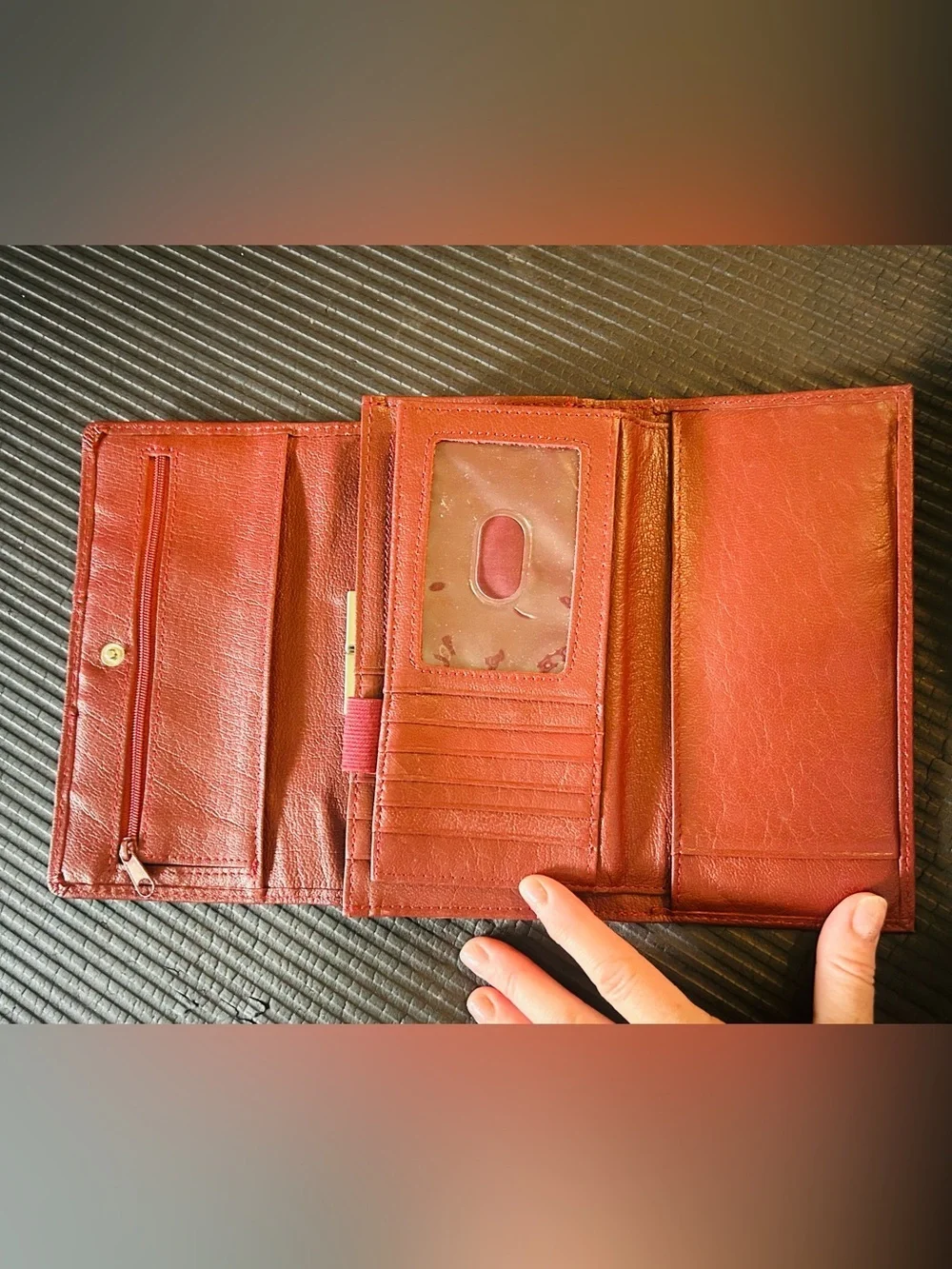 Wilson’s leather, maroon Leather trifold, wallet with Gold Accent